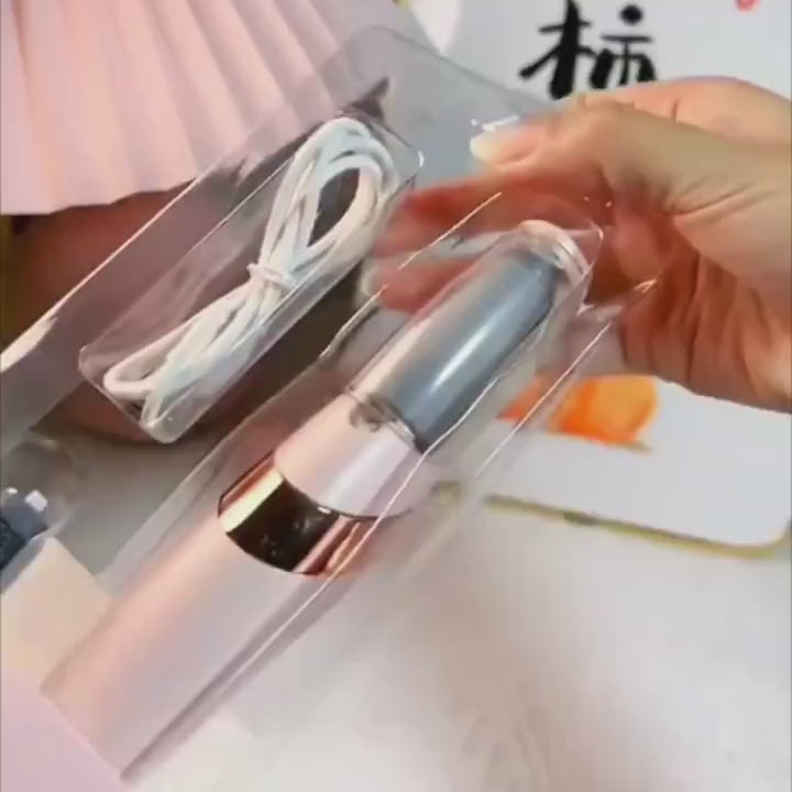 Toltrix Smooth electric callus remover smoothing a heel — in use
